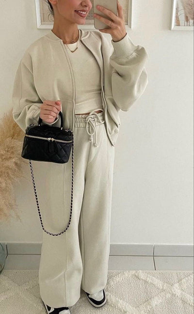 Women's casual sports set with zip-up jacket and high-waisted flared pants