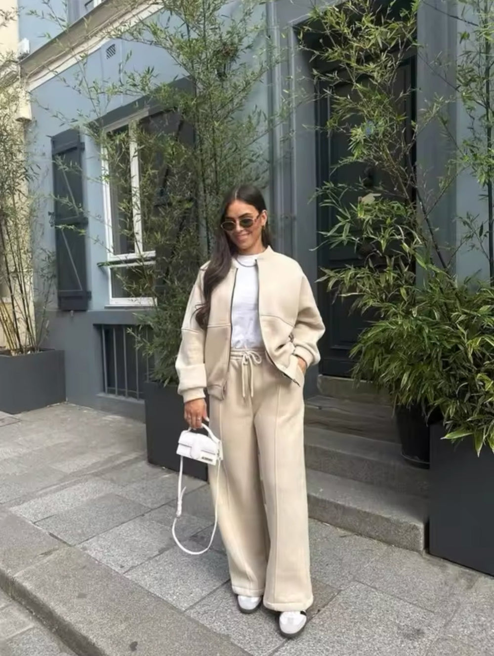 Women's casual sports set with zip-up jacket and high-waisted flared pants