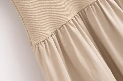 Long sleeveless casual dress with a flowing drape