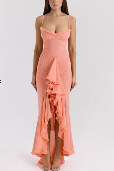 Long evening dress with thin straps and asymmetrical skirt for a sophisticated style
