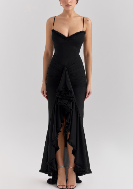 Long evening dress with thin straps and asymmetrical skirt for a sophisticated style