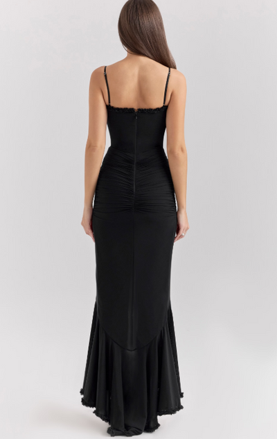 Long evening dress with thin straps and asymmetrical skirt for a sophisticated style