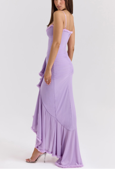 Long evening dress with thin straps and asymmetrical skirt for a sophisticated style