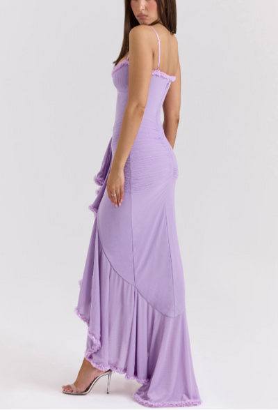 Long evening dress with thin straps and asymmetrical skirt for a sophisticated style