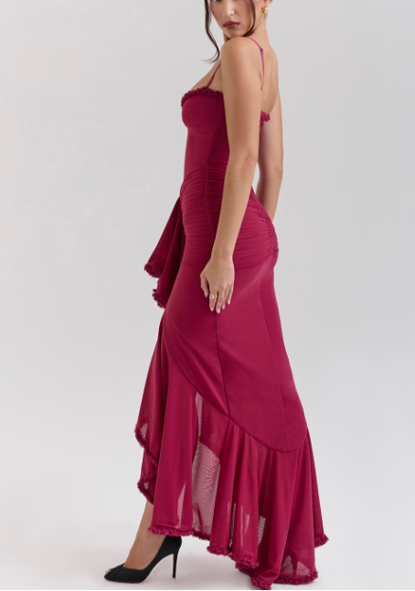 Long evening dress with thin straps and asymmetrical skirt for a sophisticated style