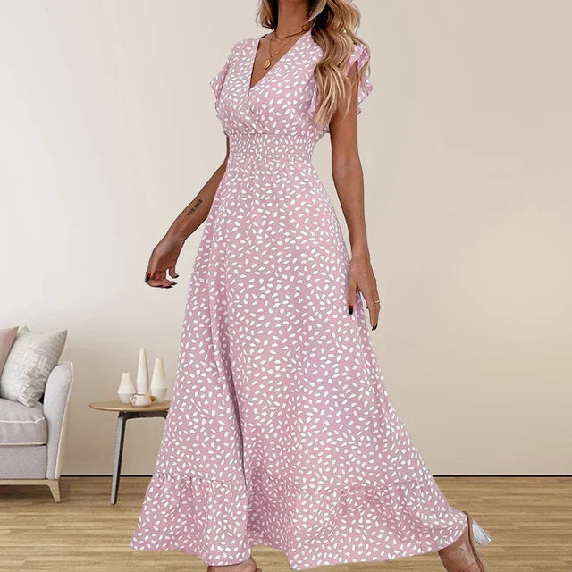 Elegant sleeveless long dress with V-neckline and gathered detail