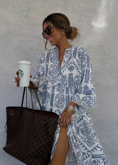 Camila - Blue mini dress with V-neckline and 3/4 sleeves