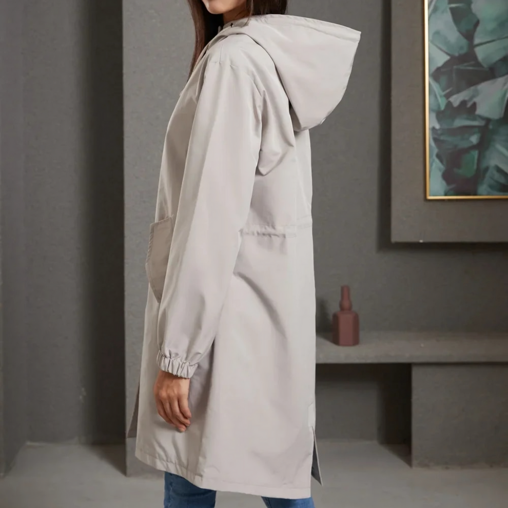 Elegant women's hooded cape with button closure