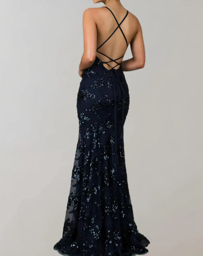 Long sleeveless shiny dress with open back