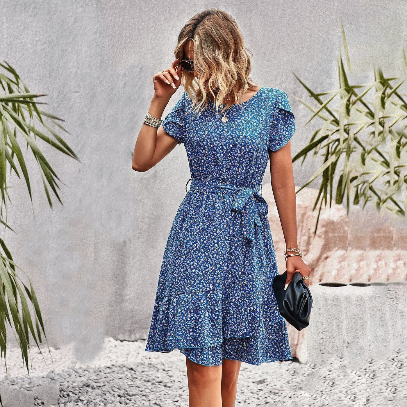 Lightweight summer dress with floral print and belt for a fresh look