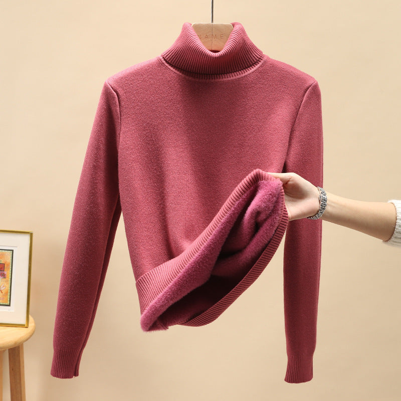 Warm turtleneck sweater with long sleeves for elegant women