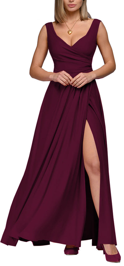 Long sleeveless evening dress with a plunging neckline and high slit