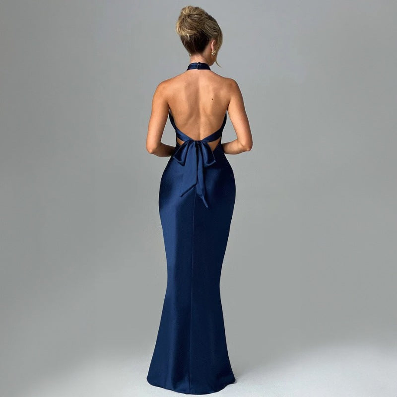 Long sleeveless dress with open back and crisscross lace-up detail