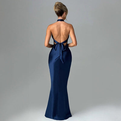 Long sleeveless dress with open back and crisscross lace-up detail