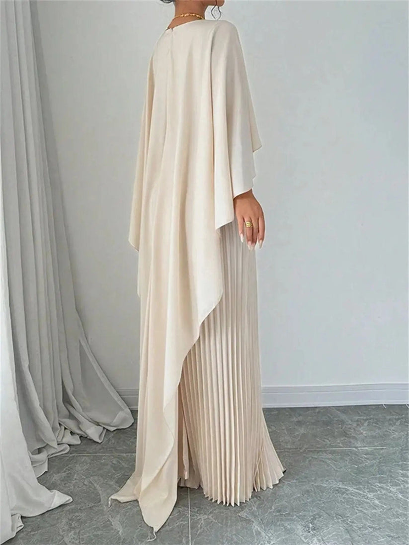Long pleated dress with flowing detail for elegant events