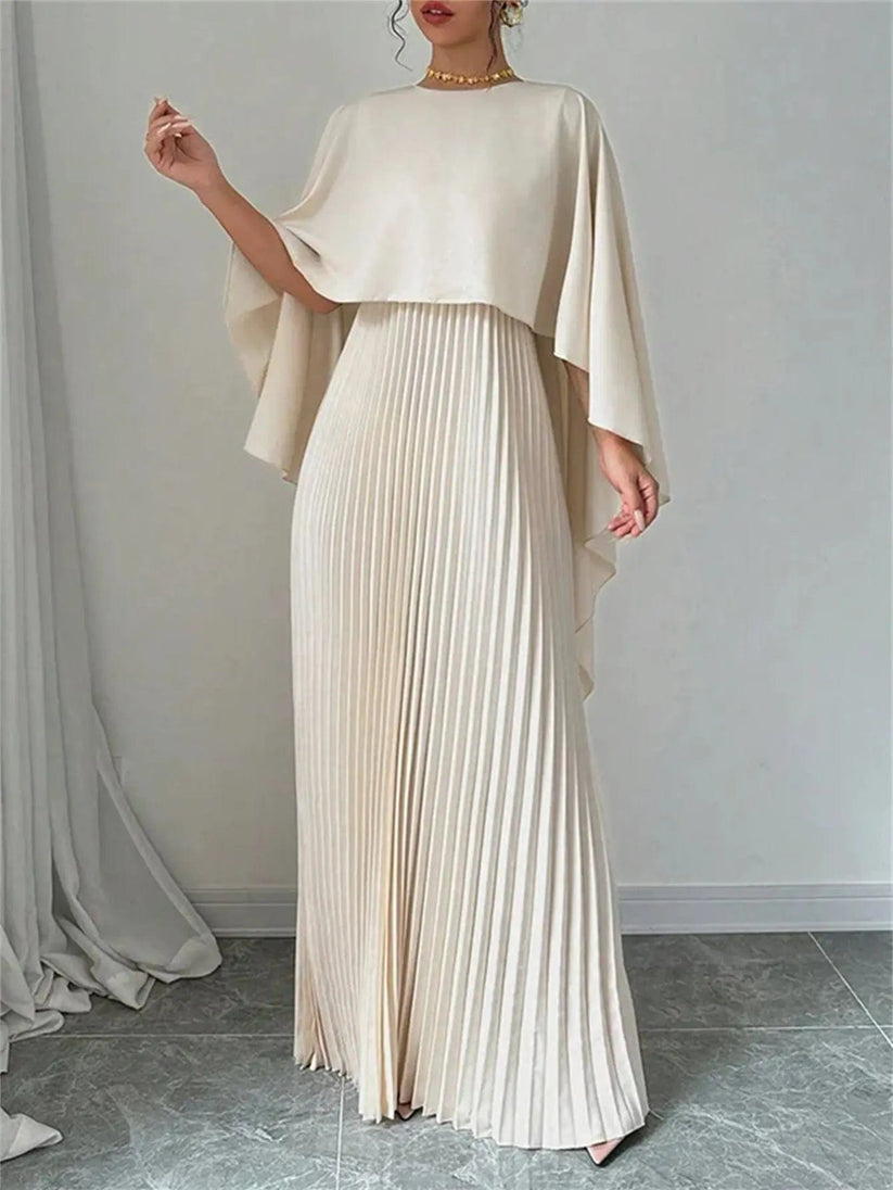 Long pleated dress with flowing detail for elegant events
