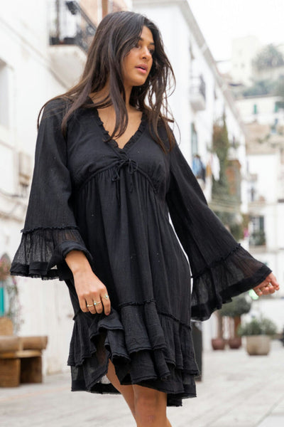 Elegant mini dress with ruffles and long sleeves