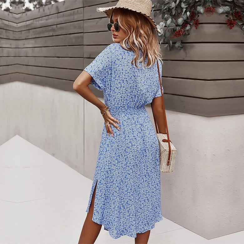 Floral print midi dress with a flowing design and front buttons