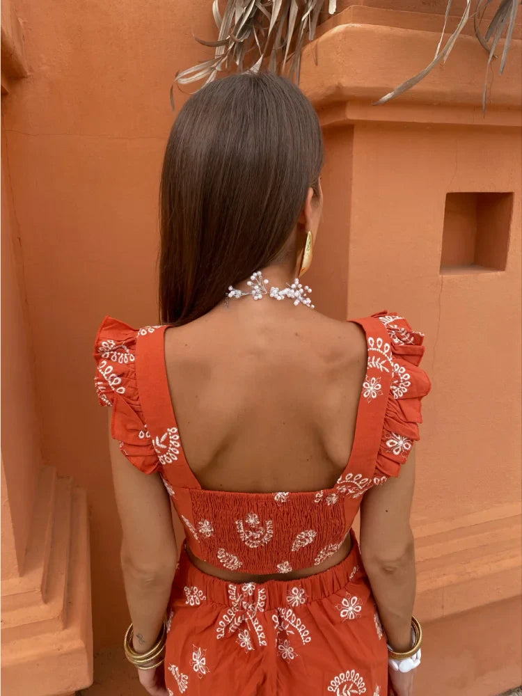 Bohemian two-piece set with crop top and flowy midi skirt