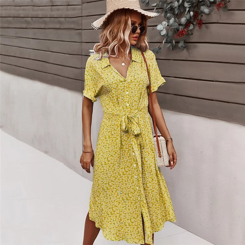 Floral print midi dress with a flowing design and front buttons