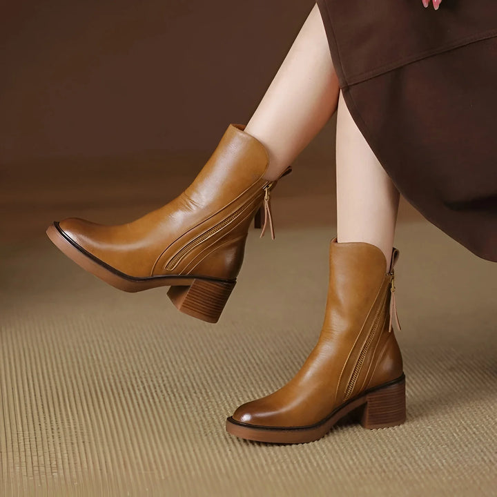 Comfortable low heel ankle boots for women with modern zipper design