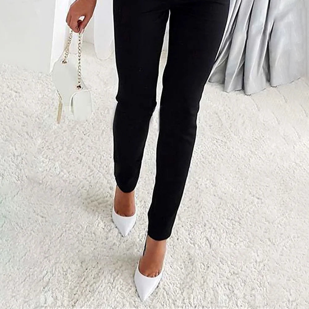 Elegant women's jumpsuit with sophisticated design and shiny sleeves