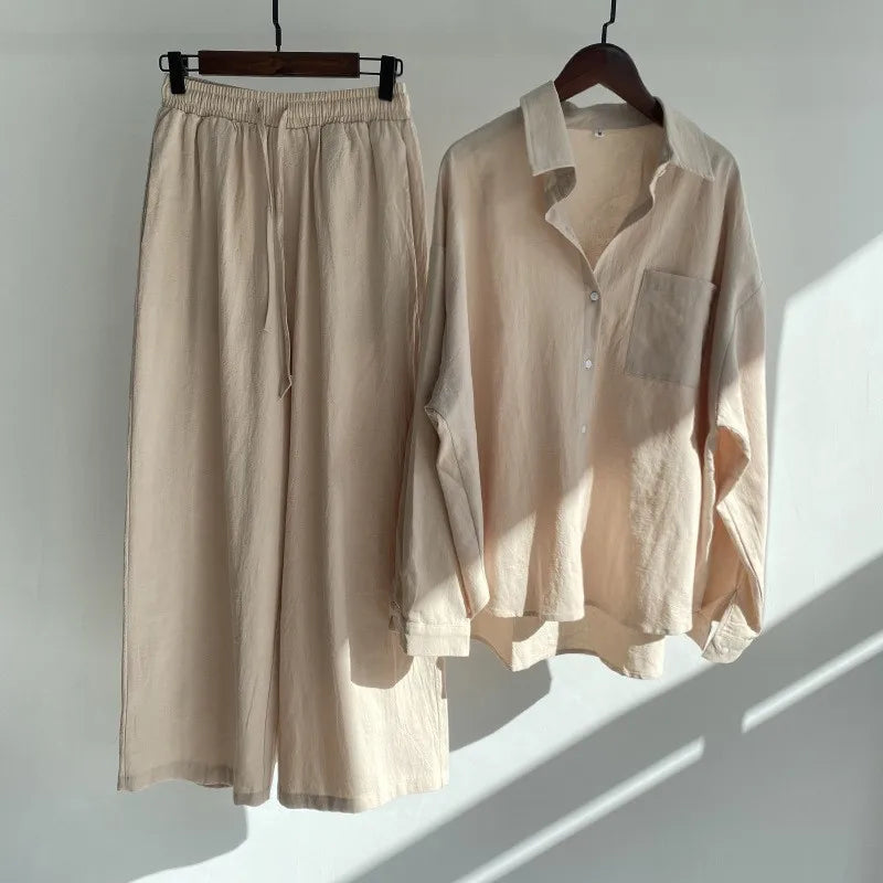 Two-piece summer set with a long-sleeved button-down shirt and wide-legged pants