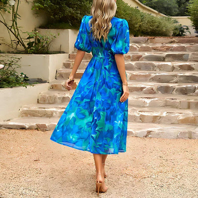 Modern women's floral midi dress with short puff sleeves