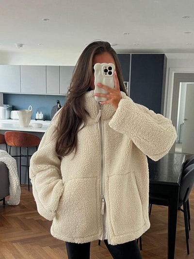 Cozy jacket with high collar and pockets