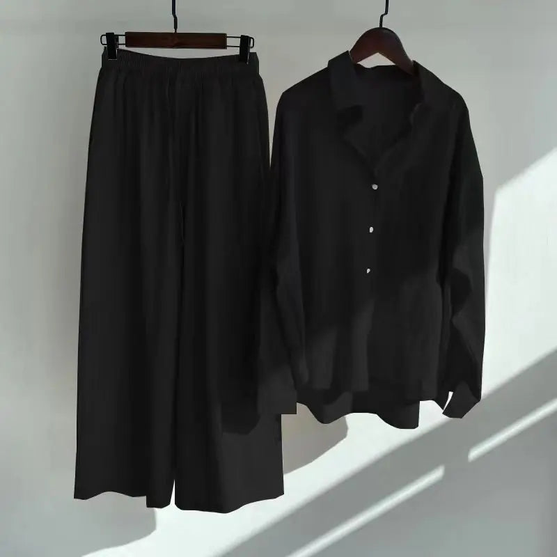 Two-piece summer set with a long-sleeved button-down shirt and wide-legged pants