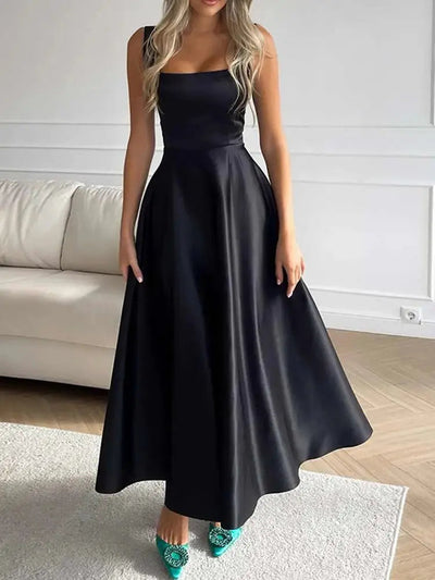Elegant midi evening dress with straps and full skirt