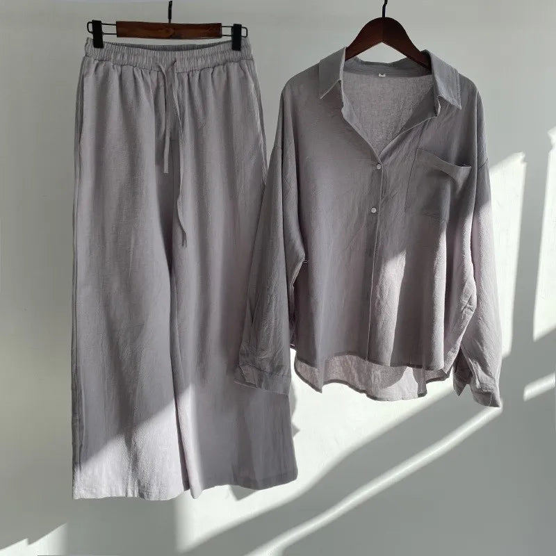 Two-piece summer set with a long-sleeved button-down shirt and wide-legged pants