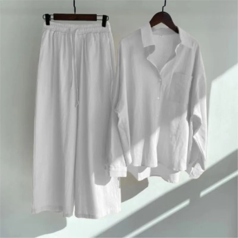 Two-piece summer set with a long-sleeved button-down shirt and wide-legged pants