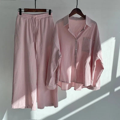 Two-piece summer set with a long-sleeved button-down shirt and wide-legged pants