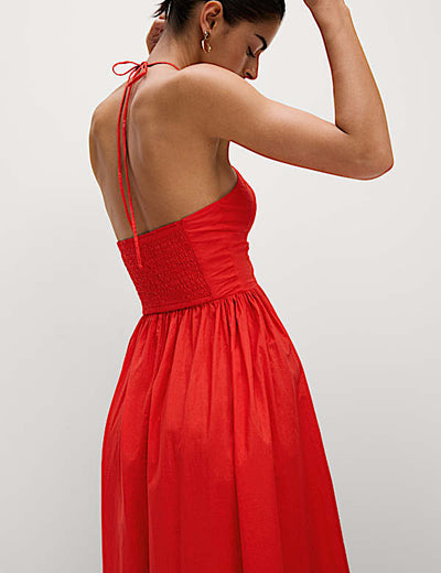 Long halter neck beach dress with elegant summer design