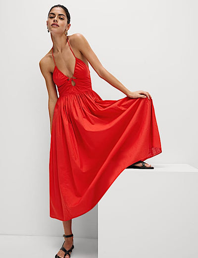 Long halter neck beach dress with elegant summer design