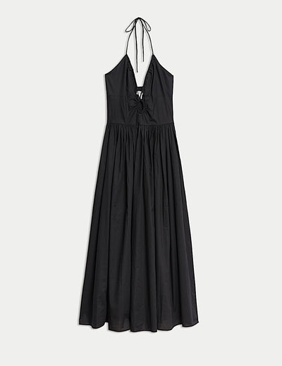 Long halter neck beach dress with elegant summer design