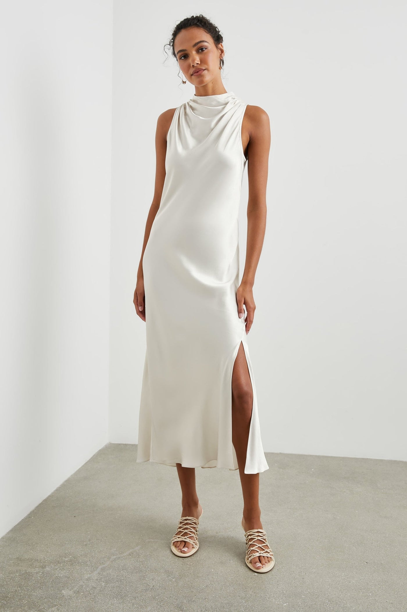 Sleeveless halterneck midi dress with sophisticated style