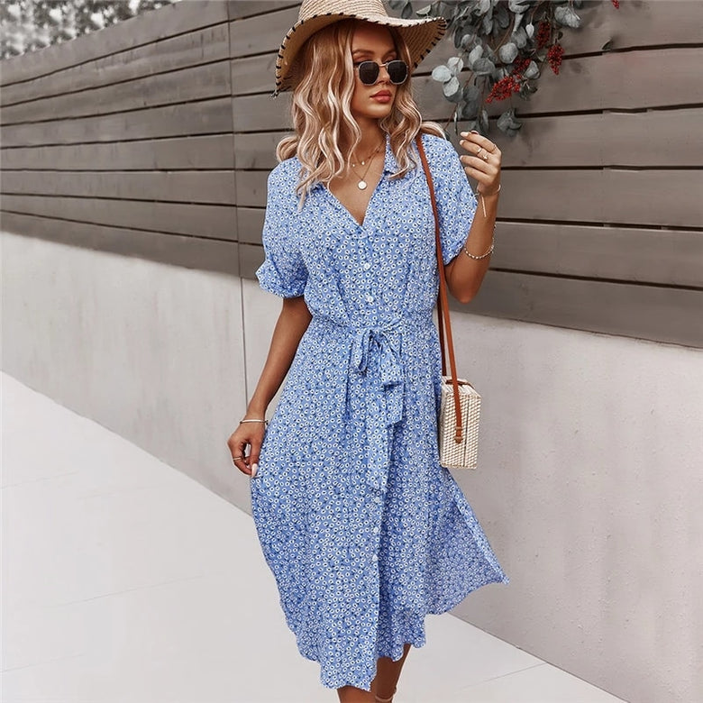 Floral print midi dress with a flowing design and front buttons