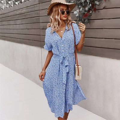 Floral print midi dress with a flowing design and front buttons