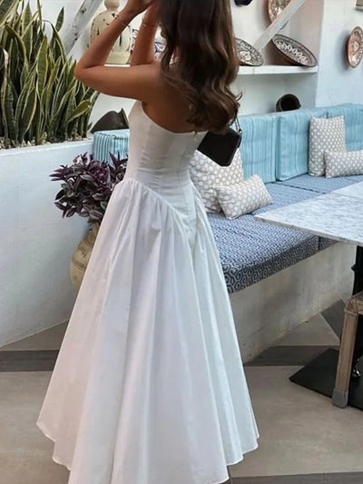 Sleeveless dress with a V-neckline and an open back design