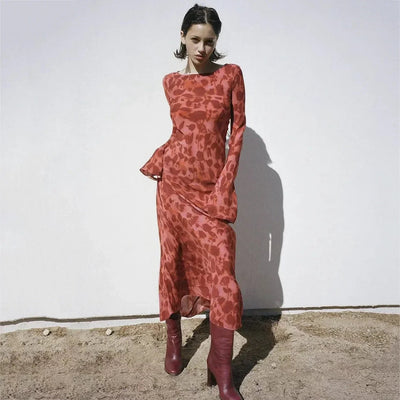 Elegant long dress with floral print and long sleeves