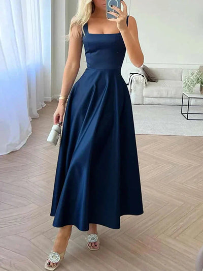 Elegant midi evening dress with straps and full skirt