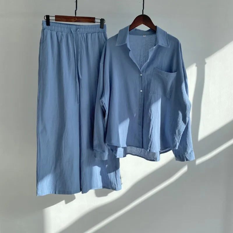 Two-piece summer set with a long-sleeved button-down shirt and wide-legged pants