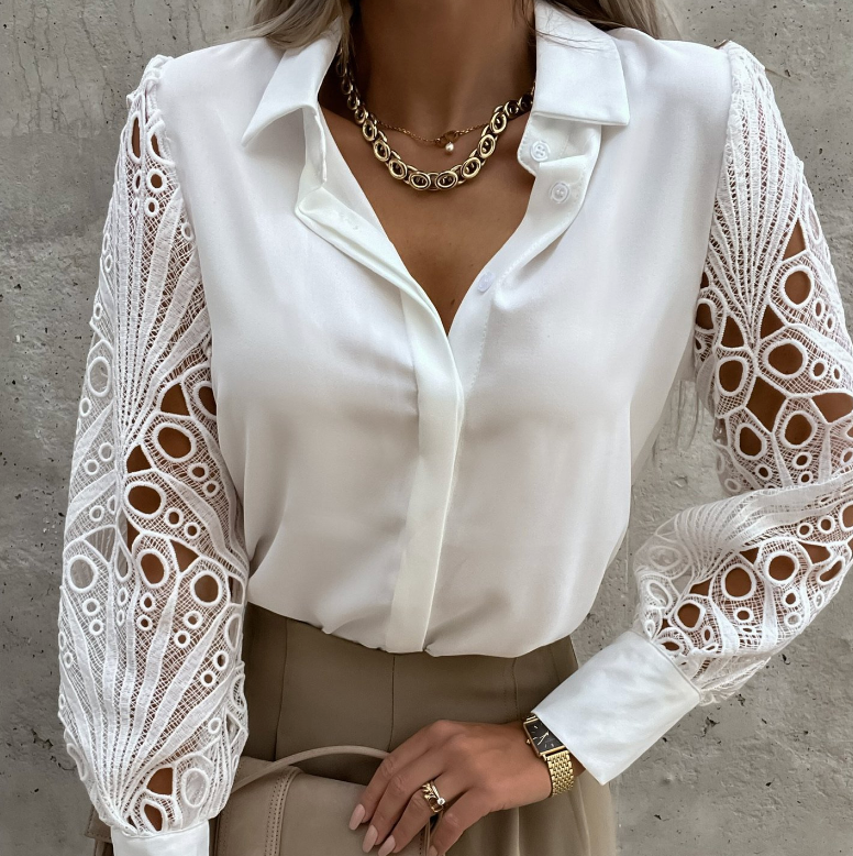 Feminine blouse with decorative long sleeves and elegant design