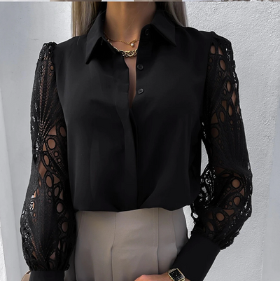 Feminine blouse with decorative long sleeves and elegant design