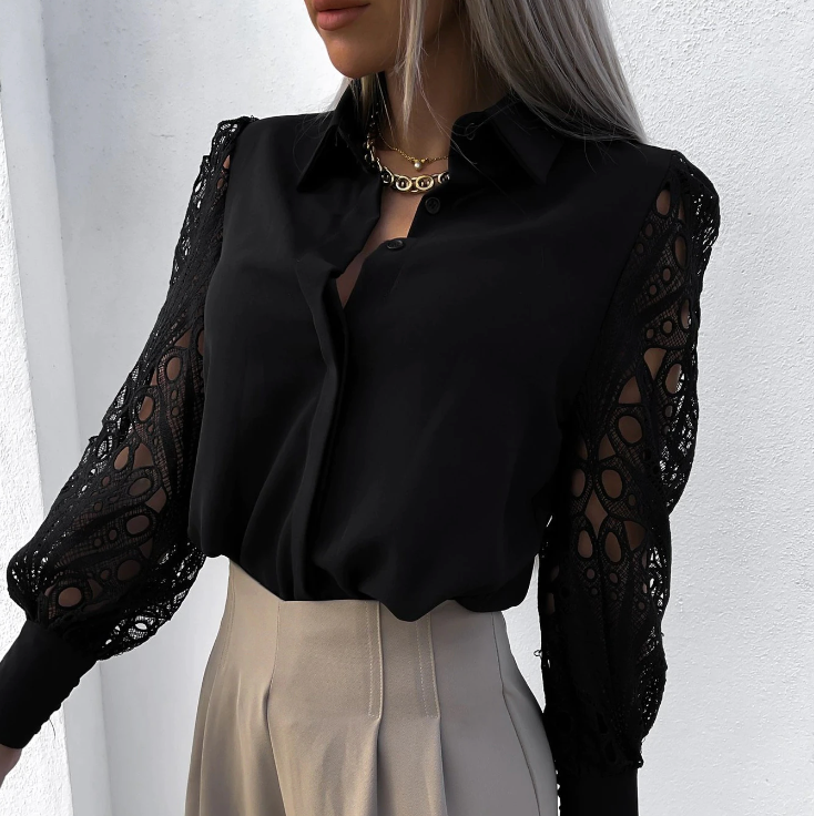 Feminine blouse with decorative long sleeves and elegant design