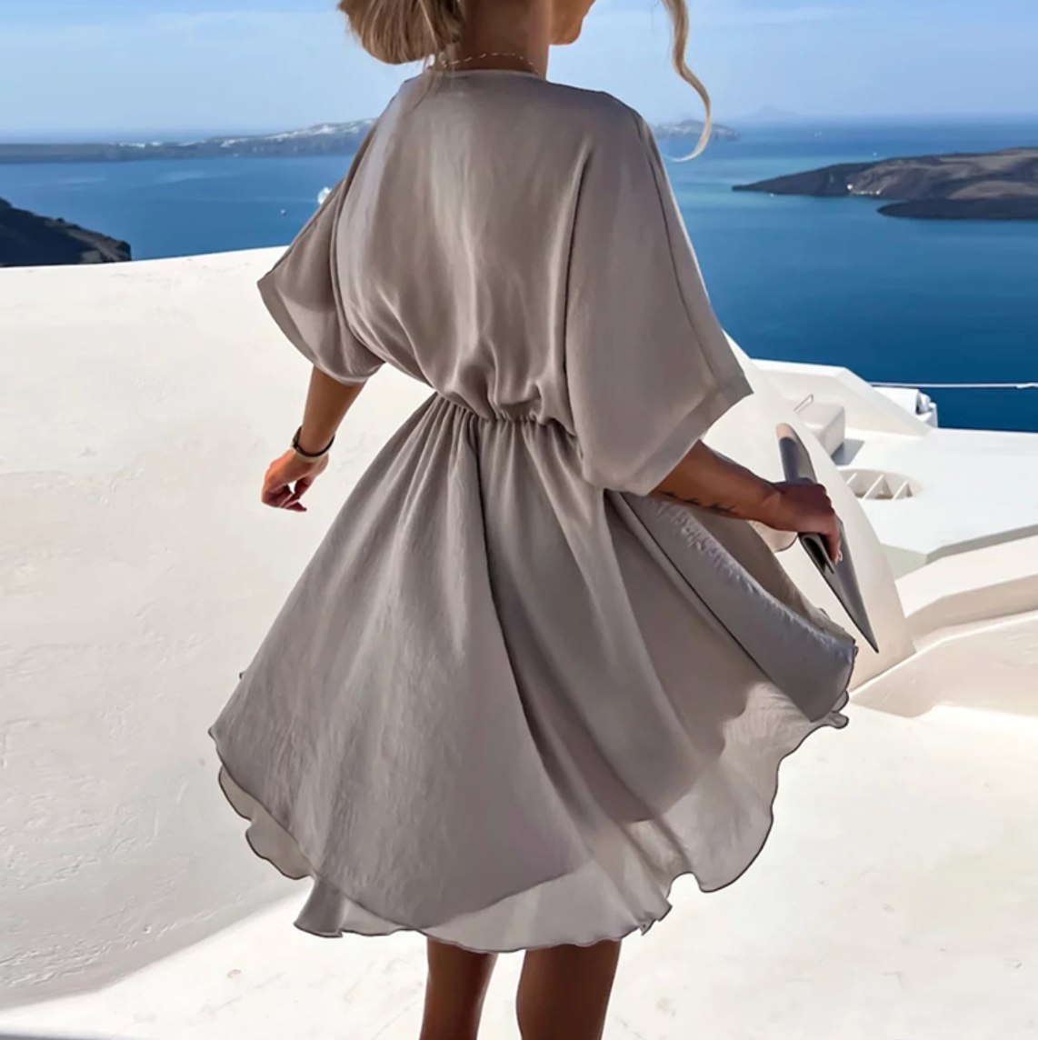 Wide mini dress with summer style and modern design