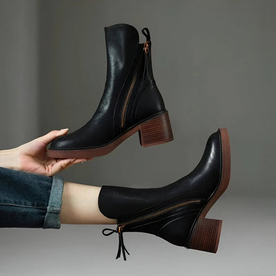 Comfortable low heel ankle boots for women with modern zipper design