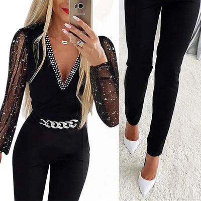 Elegant women's jumpsuit with sophisticated design and shiny sleeves